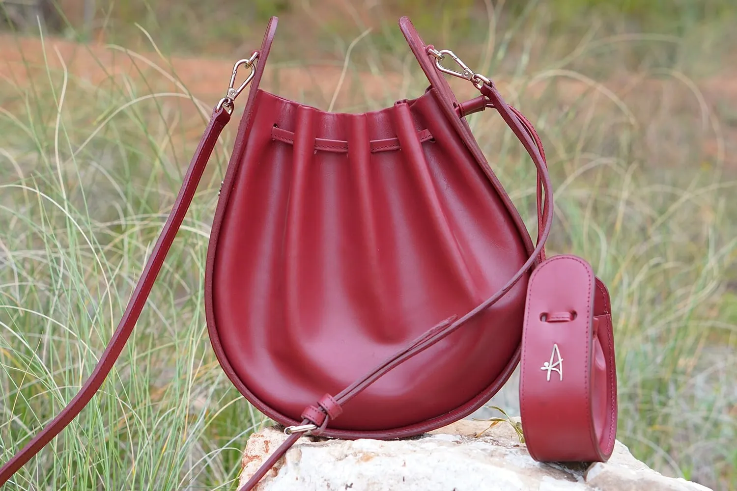 A leather handbag with visible stitching and hardware