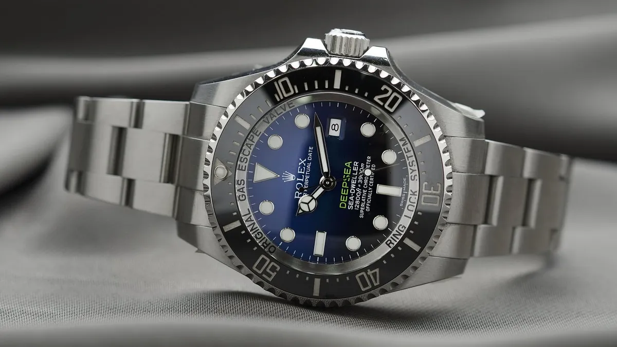 A stainless steel dive watch with a matching link bracelet